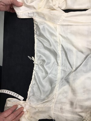 Lot 75 - An ivory silk dress, French, circa 1809-13