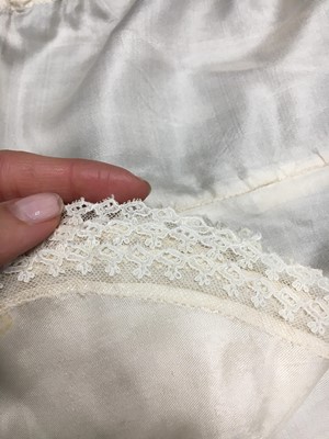 Lot 75 - An ivory silk dress, French, circa 1809-13