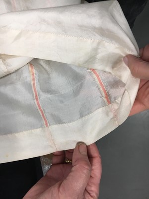 Lot 75 - An ivory silk dress, French, circa 1809-13