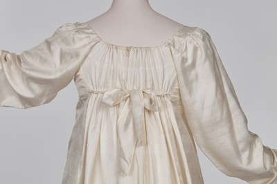 Lot 75 - An ivory silk dress, French, circa 1809-13