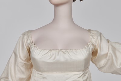 Lot 75 - An ivory silk dress, French, circa 1809-13
