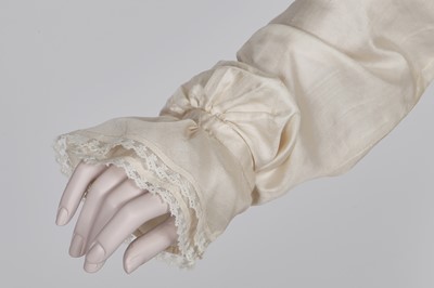 Lot 75 - An ivory silk dress, French, circa 1809-13