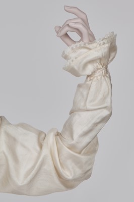 Lot 75 - An ivory silk dress, French, circa 1809-13
