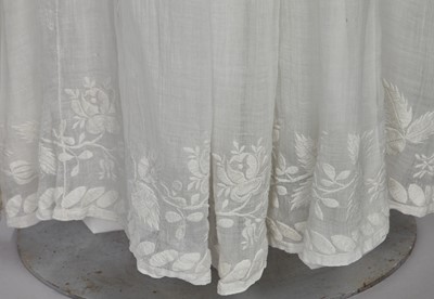 Lot 77 - A figured sarsanet spencer and muslin petticoat, English, circa 1810-15