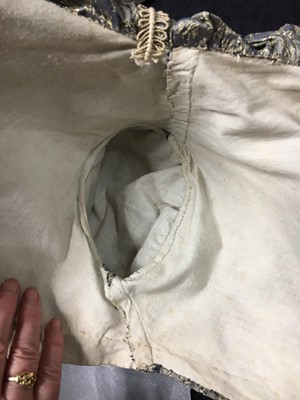 Lot 77 - A figured sarsanet spencer and muslin petticoat, English, circa 1810-15