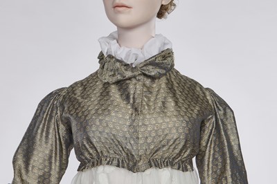 Lot 77 - A figured sarsanet spencer and muslin petticoat, English, circa 1810-15