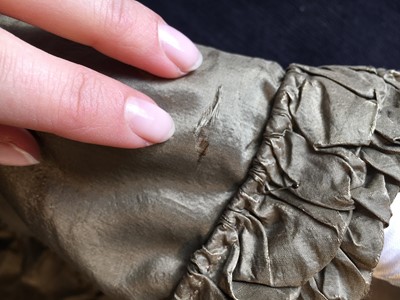 Lot 82 - A green-brown shot silk taffeta dress, French, circa 1810