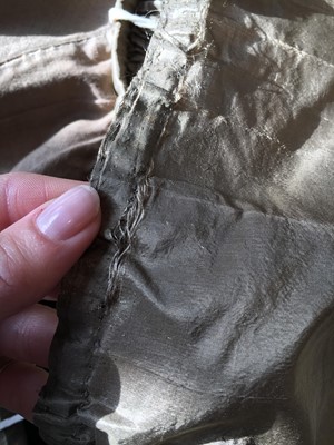 Lot 82 - A green-brown shot silk taffeta dress, French, circa 1810