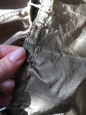 Lot 82 - A green-brown shot silk taffeta dress, French, circa 1810