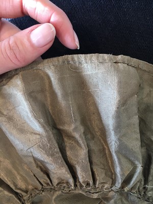 Lot 82 - A green-brown shot silk taffeta dress, French, circa 1810