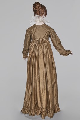 Lot 82 - A green-brown shot silk taffeta dress, French, circa 1810