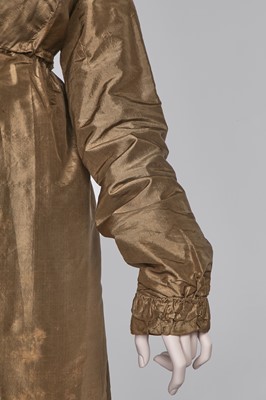 Lot 82 - A green-brown shot silk taffeta dress, French, circa 1810
