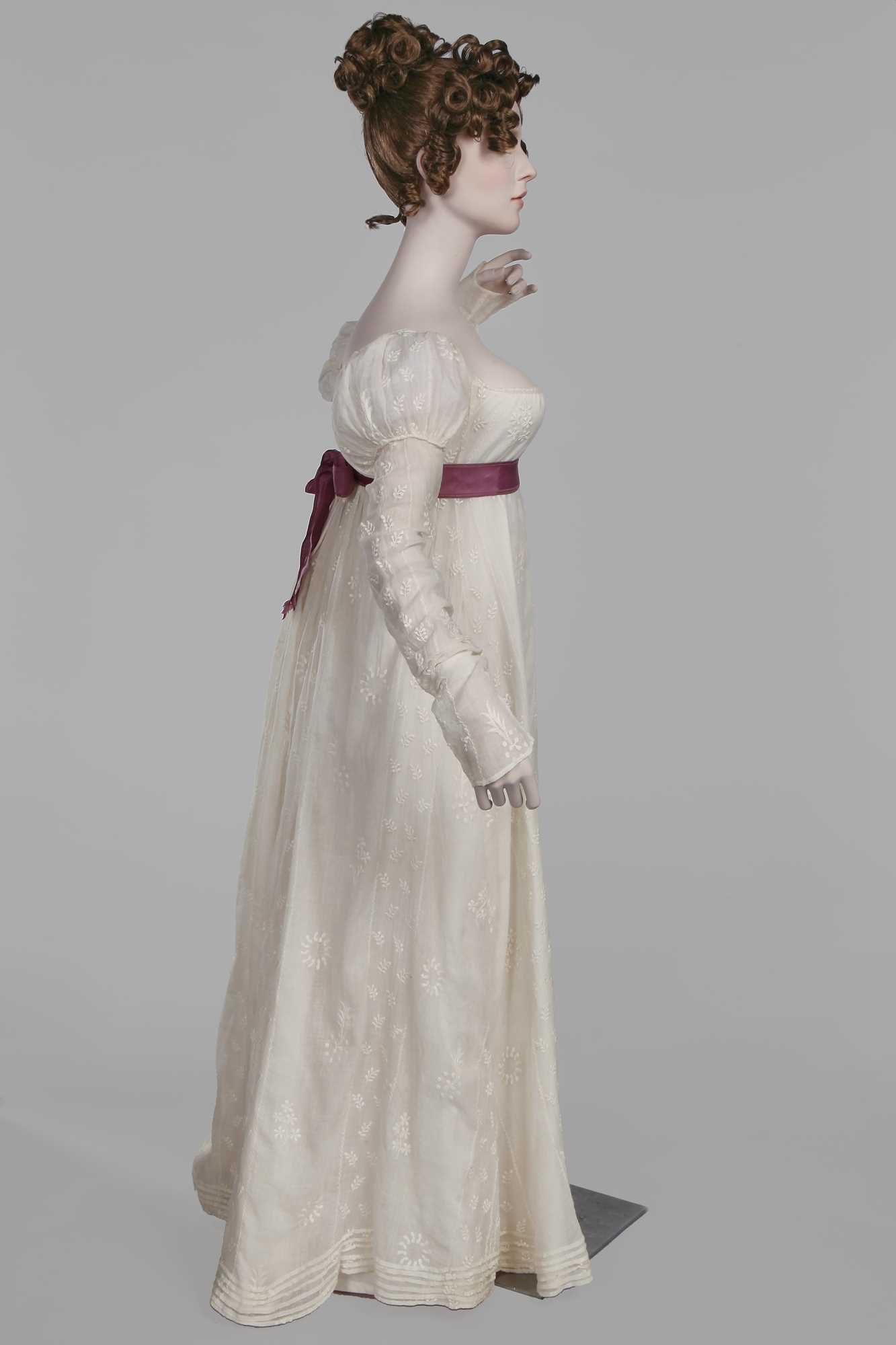 Lot 81 - A whiteworked muslin day dress, English, circa 1810