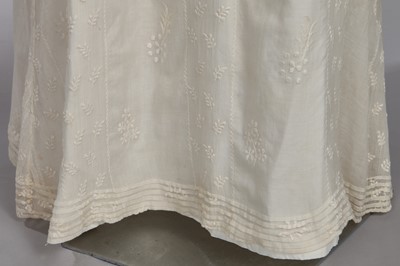 Lot 81 - A whiteworked muslin day dress, English, circa 1810