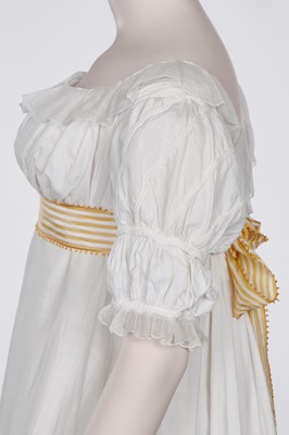 Lot 87 - A white cotton afternoon dress, English, circa 1812-13