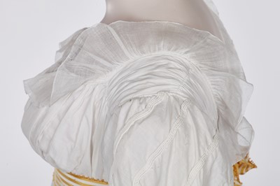 Lot 87 - A white cotton afternoon dress, English, circa 1812-13