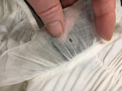 Lot 87 - A white cotton afternoon dress, English, circa 1812-13