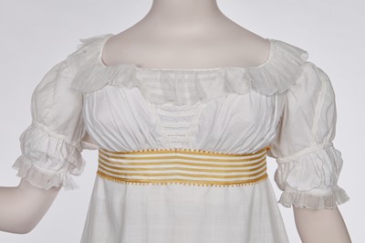 Lot 87 - A white cotton afternoon dress, English, circa 1812-13