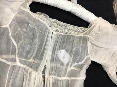 Lot 76 - A whiteworked muslin afternoon dress, English, circa 1810-12