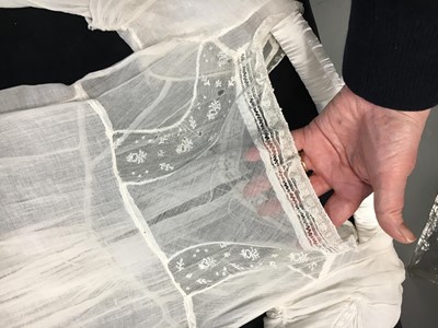 Lot 76 - A whiteworked muslin afternoon dress, English, circa 1810-12