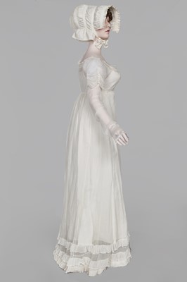 Lot 76 - A whiteworked muslin afternoon dress, English, circa 1810-12