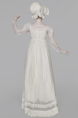 Lot 76 - A whiteworked muslin afternoon dress, English, circa 1810-12