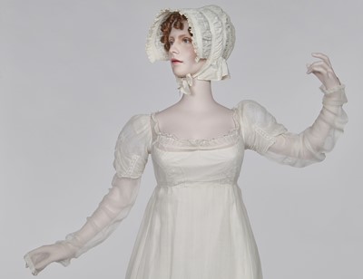Lot 76 - A whiteworked muslin afternoon dress, English, circa 1810-12