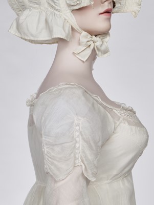 Lot 76 - A whiteworked muslin afternoon dress, English, circa 1810-12