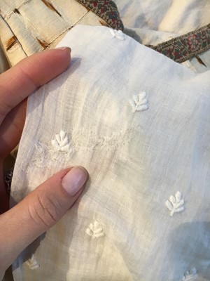 Lot 29 - A clouded satin-striped poplin over dress and a muslin gown, circa 1805