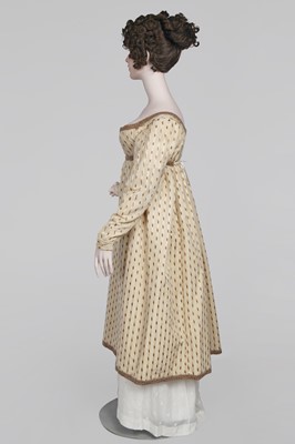 Lot 29 - A clouded satin-striped poplin over dress and a muslin gown, circa 1805