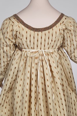 Lot 29 - A clouded satin-striped poplin over dress and a muslin gown, circa 1805