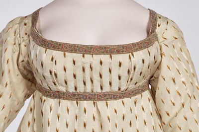 Lot 29 - A clouded satin-striped poplin over dress and a muslin gown, circa 1805