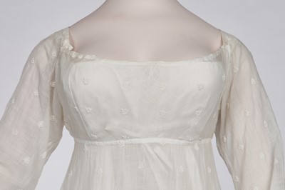 Lot 29 - A clouded satin-striped poplin over dress and a muslin gown, circa 1805