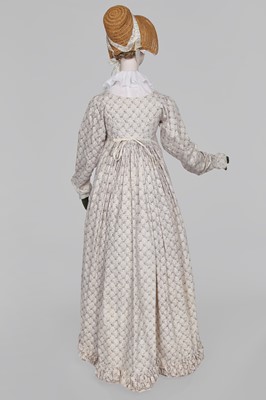 Lot 675 - A roller-printed cotton day dress, French or English, circa 1810-12