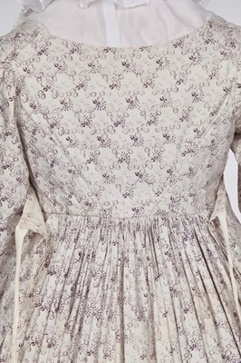 Lot 675 - A roller-printed cotton day dress, French or English, circa 1810-12