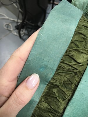 Lot 104 - A rare green silk poke bonnet/calash, circa 1806