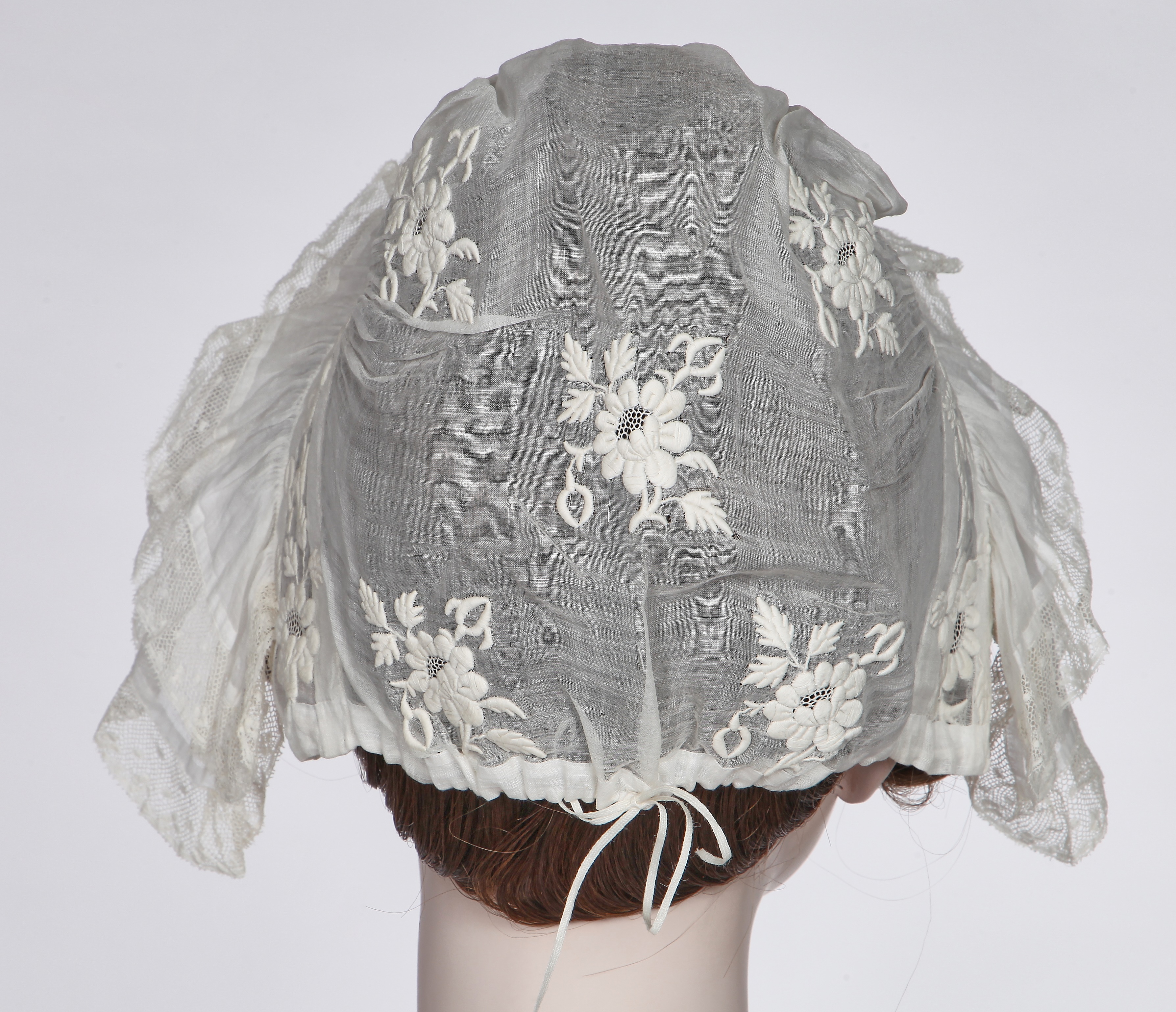 Lot 104 - A rare green silk poke bonnet/calash, circa