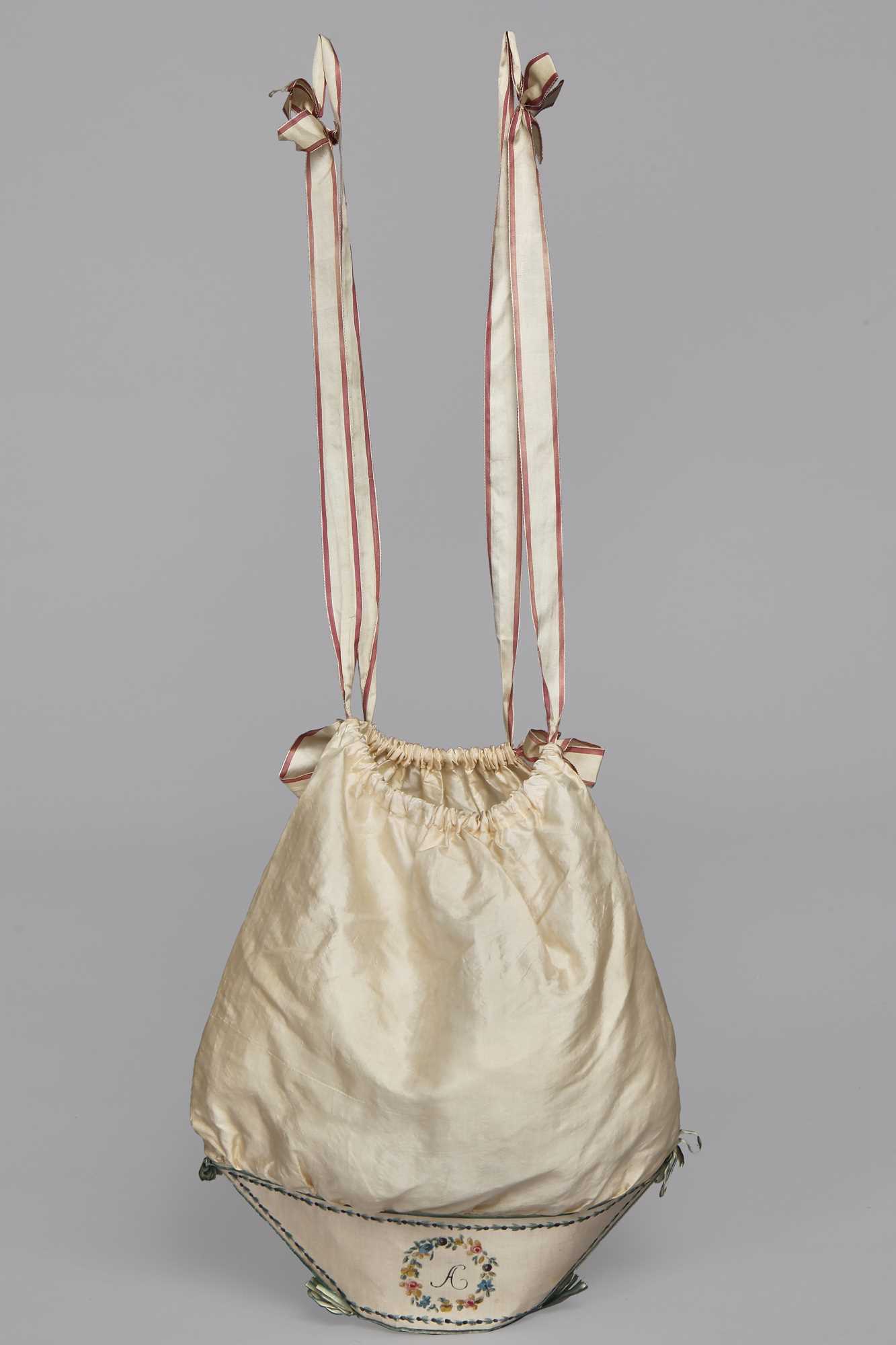 Lot 24 - An ivory silk work bag, English or French, 1815-25