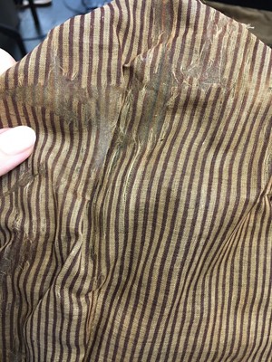 Lot 107 - A rare woven wood and striped cotton bonnet, circa 1806