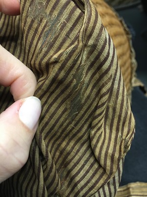 Lot 107 - A rare woven wood and striped cotton bonnet, circa 1806