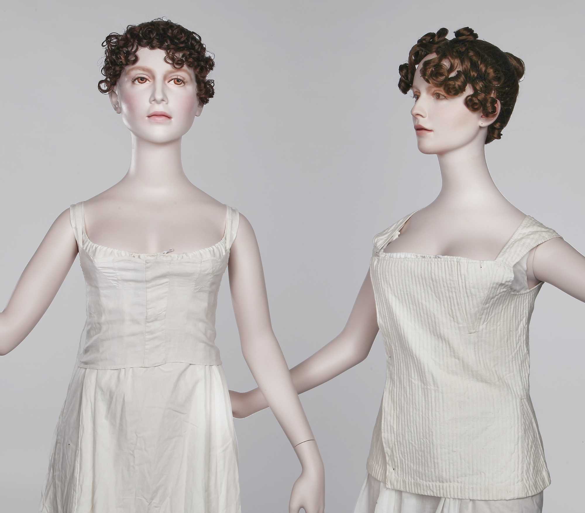 Lot 26 - A pair of girl's white linen short stays, probably French, circa 1805