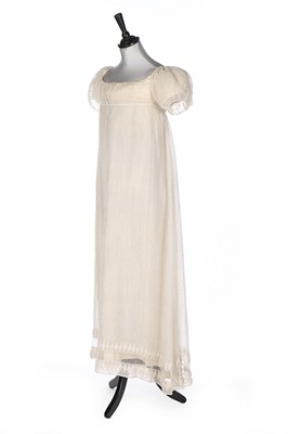 Lot 377 - A whitework embroidered muslin dress, circa...