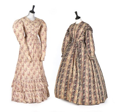 Lot 385 - Two printed gowns, the first late 1820s-early...