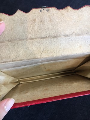 Lot 56 - A scarlet morocco leather purse, French 1800-1810