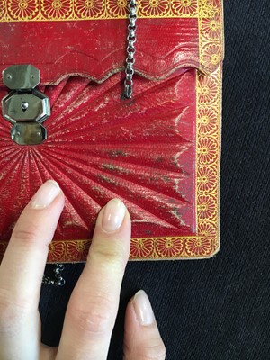 Lot 56 - A scarlet morocco leather purse, French 1800-1810