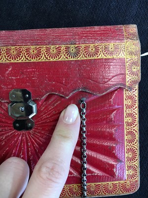 Lot 56 - A scarlet morocco leather purse, French 1800-1810