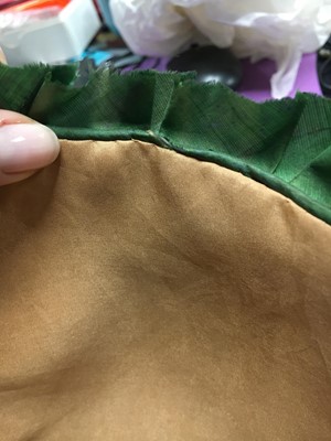 Lot 58 - A green silk bonnet, 1806-1809