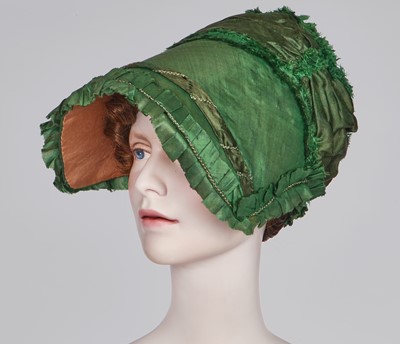 Lot 58 - A green silk bonnet, 1806-1809