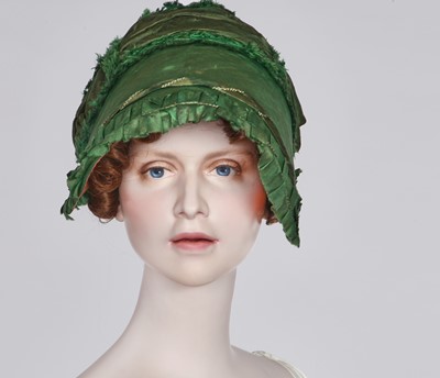 Lot 58 - A green silk bonnet, 1806-1809