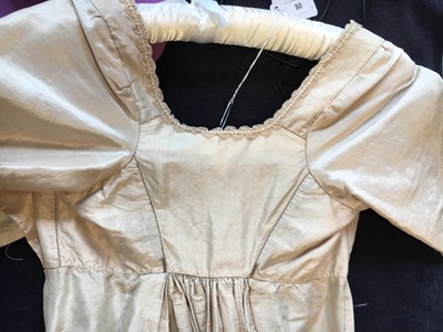 Lot 80 - A blush silk taffeta dress, French, circa 1810